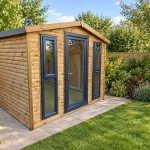 9 x 8 light oak log lap garden room with anthracite glazed door and windows in a landscaped garden